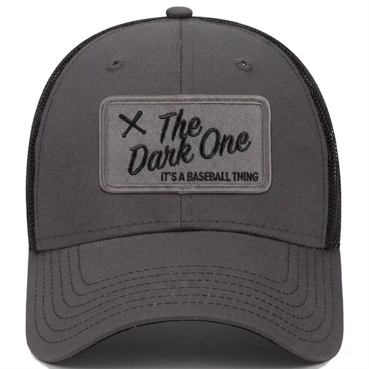 The Dark One low profile trucker hat in charcoal, front view