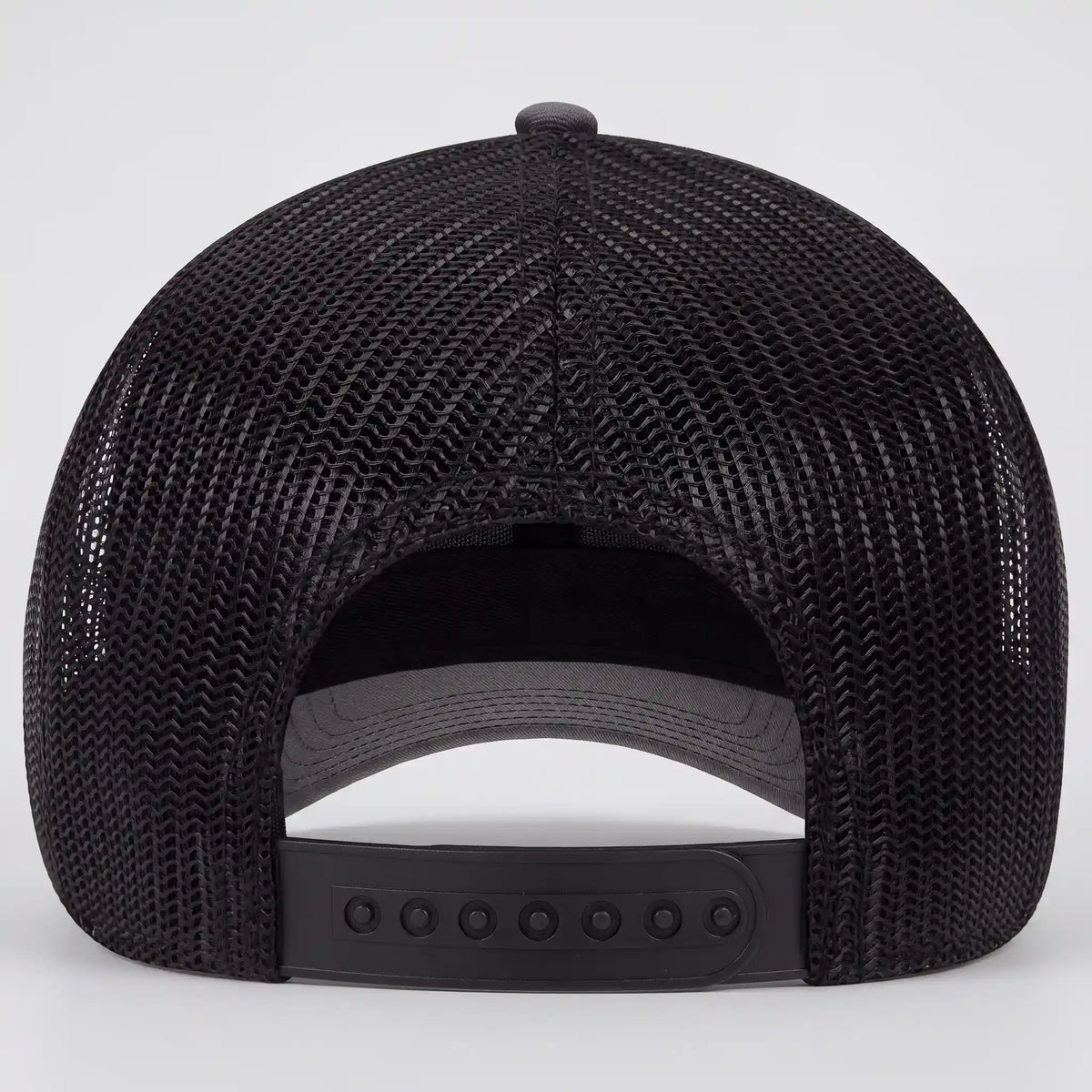 Adjustable closure on Died A Hero low profile trucker hat in charcoal